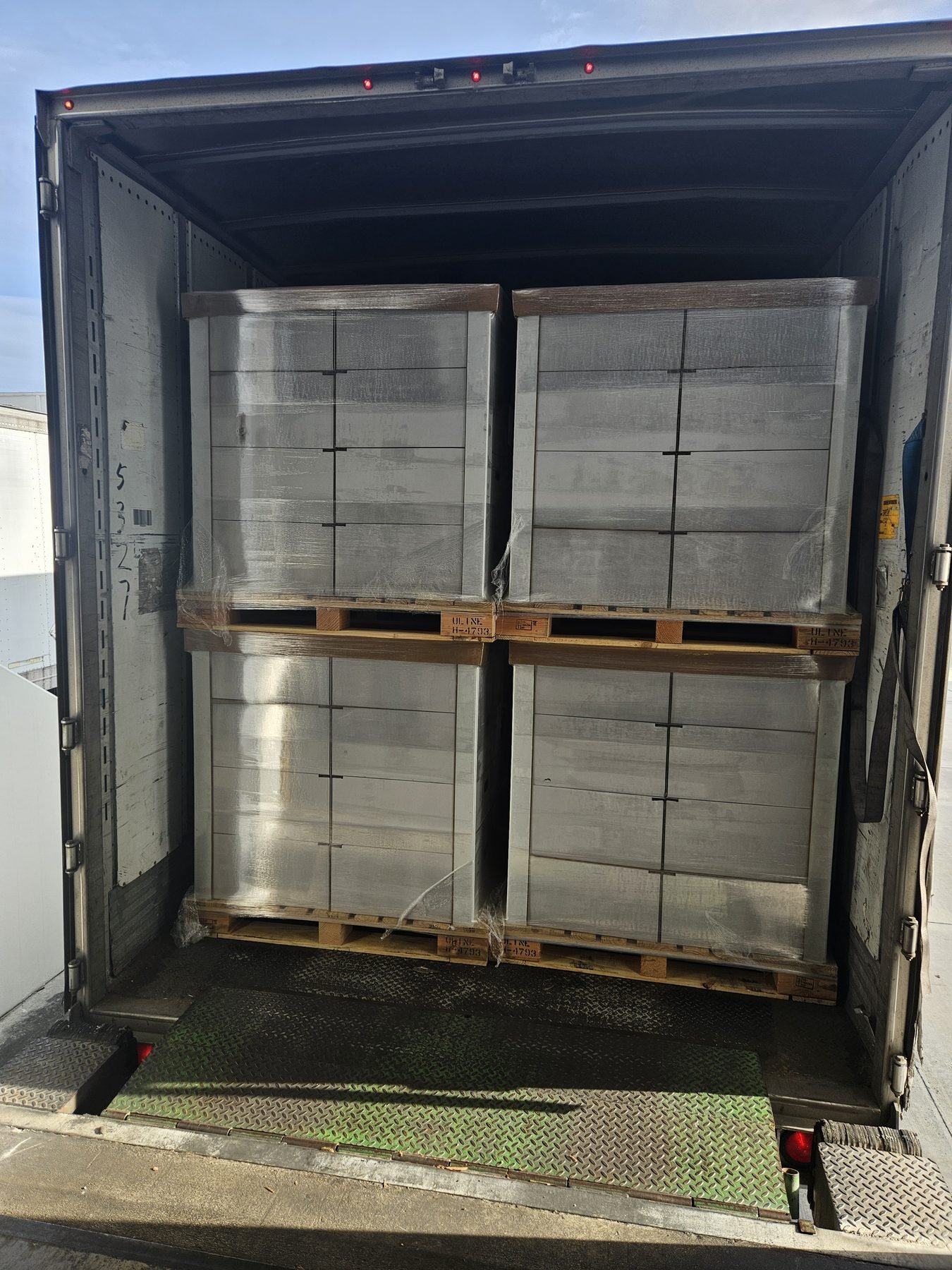 Wrapped pallets loaded and secured for outbound departure