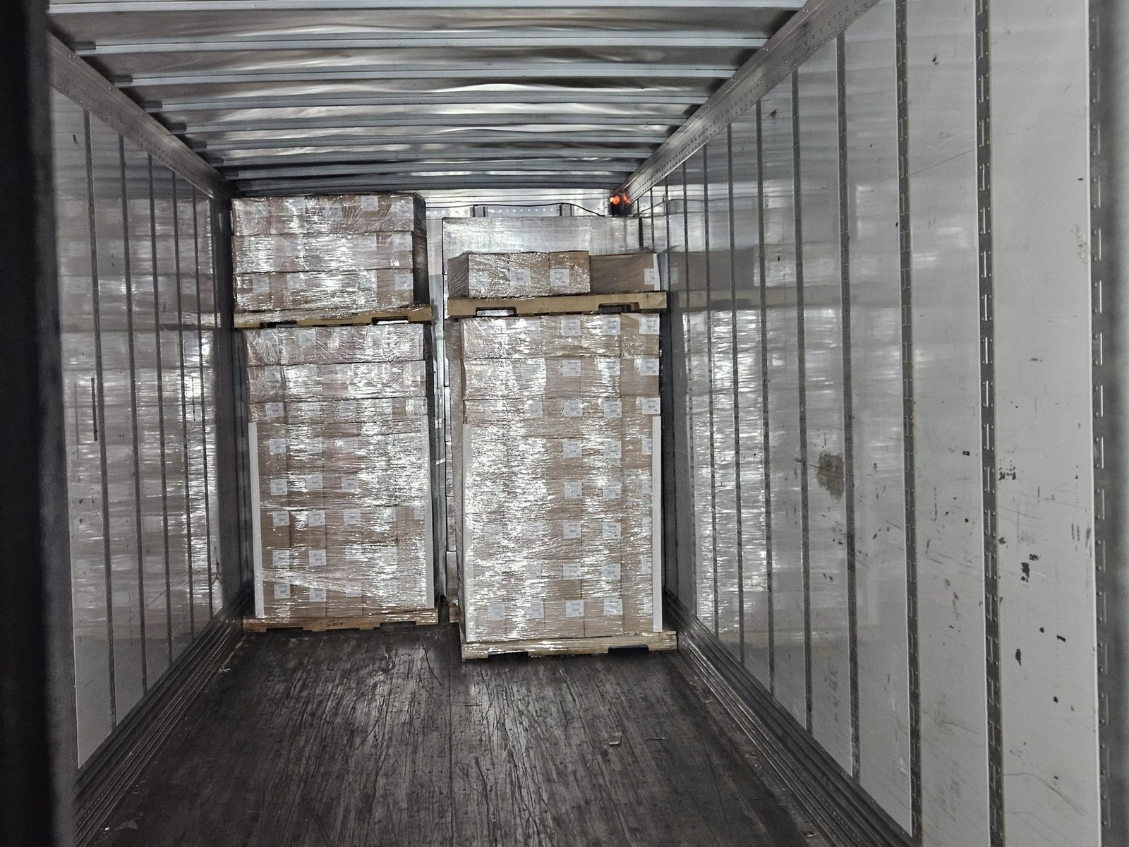 Palletized freight loaded inside a trailer at the Miami dock