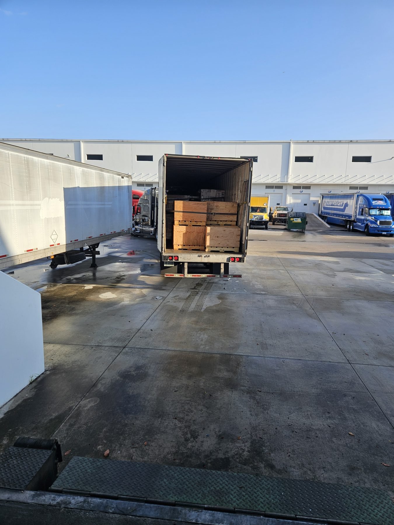 Trailer backed into the yard at the Miami warehouse